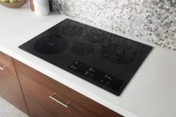 Whirlpool® 30" Black Electric Cooktop -Professional Kitchen Appliance Store 25e75f14 ad0a 4699 9b7f af5aa0e5a6b0