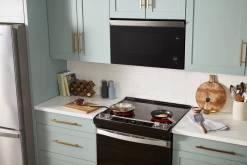 Whirlpool® 1.1 Cu. Ft. Black Over The Range Microwave -Professional Kitchen Appliance Store 3bf9139c d2fa 47fc 9753 7f2af24ac98b